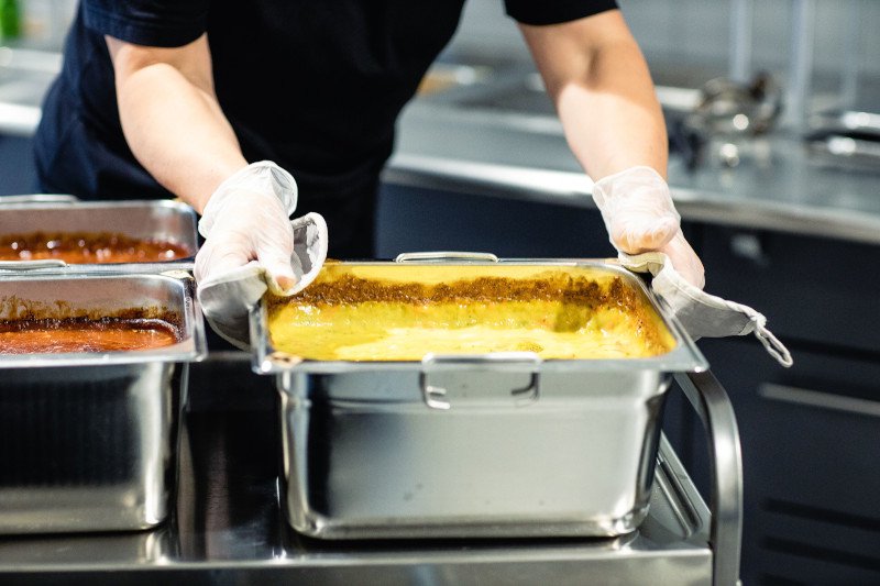 Cook cold food is cooked in the oven in the service kitchen